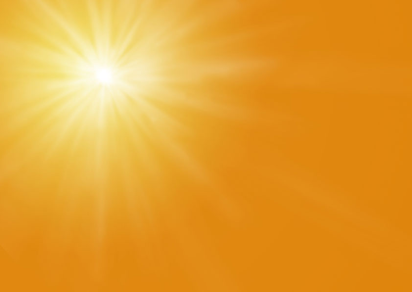Sonnenstrahlung auf orangenem Hintergrund.